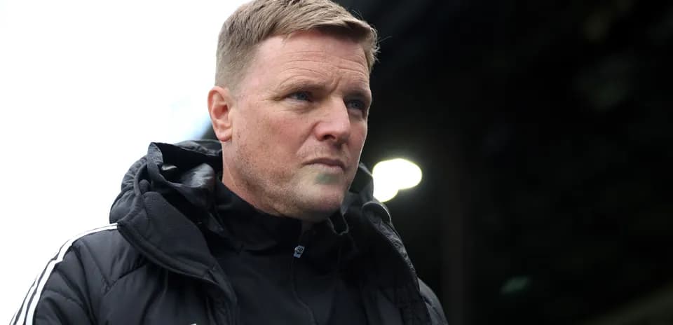 Coach observing match from the sidelines