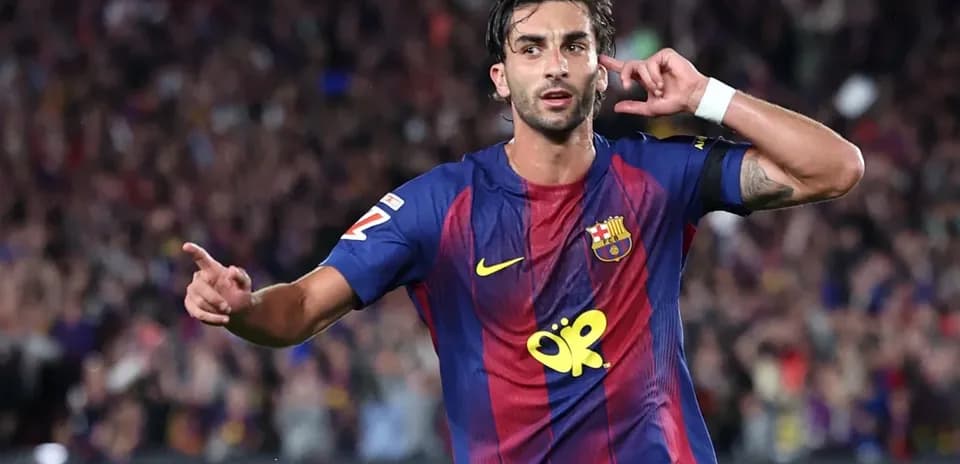 Barcelona player celebrating a goal at Camp Nou
