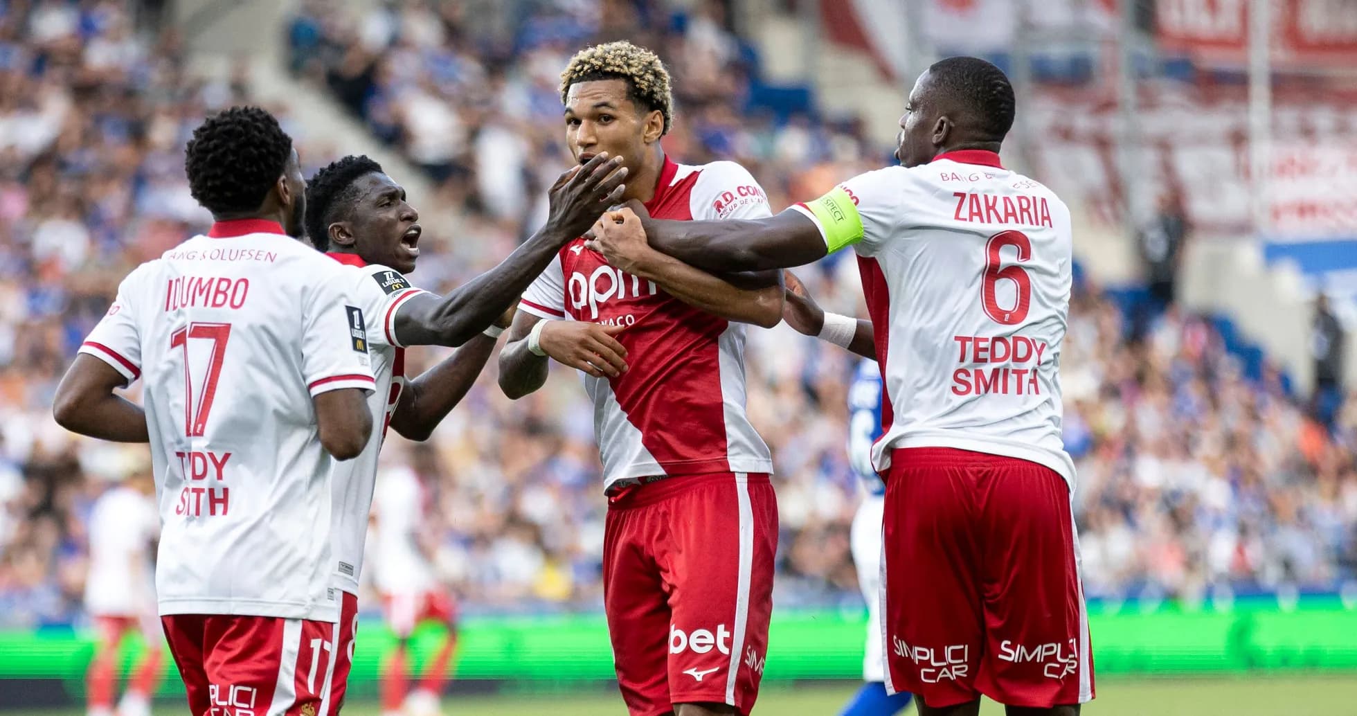 Players celebrating a goal during the match