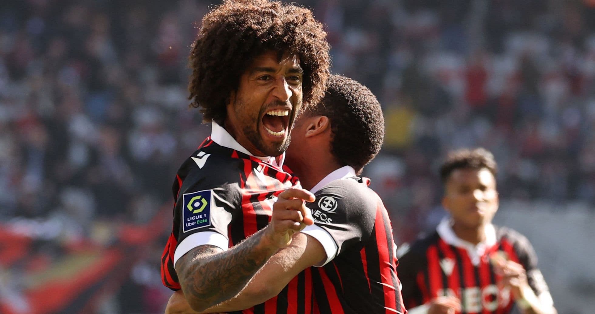Players celebrating a goal during a match
