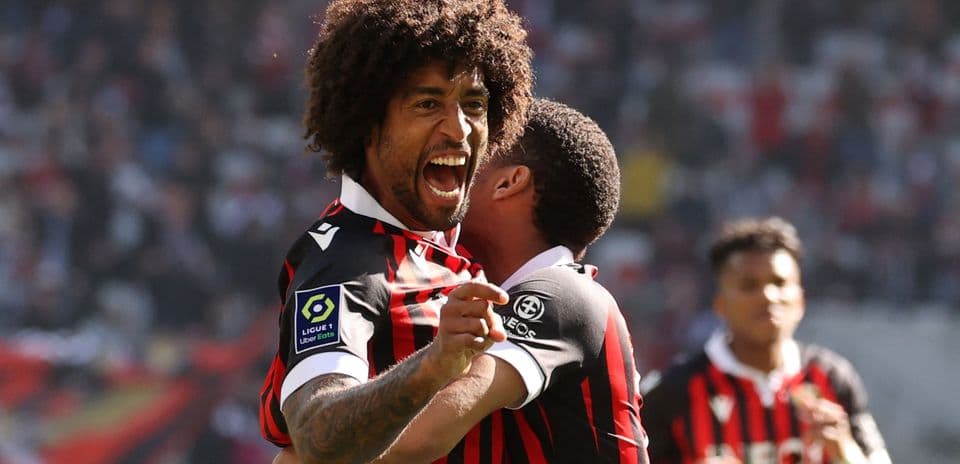 Players celebrating a goal during a match