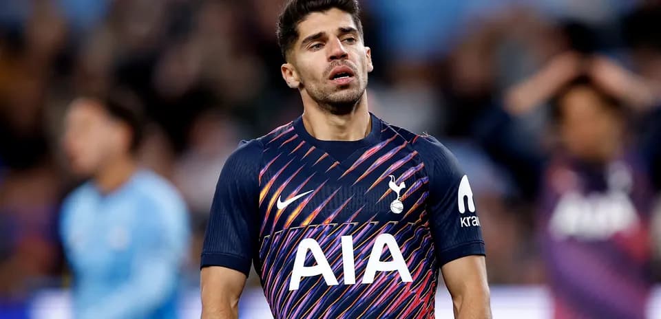 Tottenham player looking down during a match