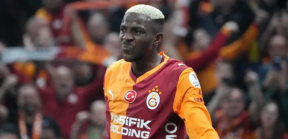 Galatasaray player celebrating in front of fans