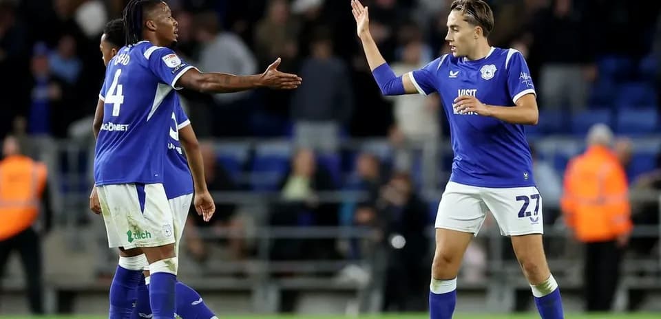 Cardiff City players celebrating after a match