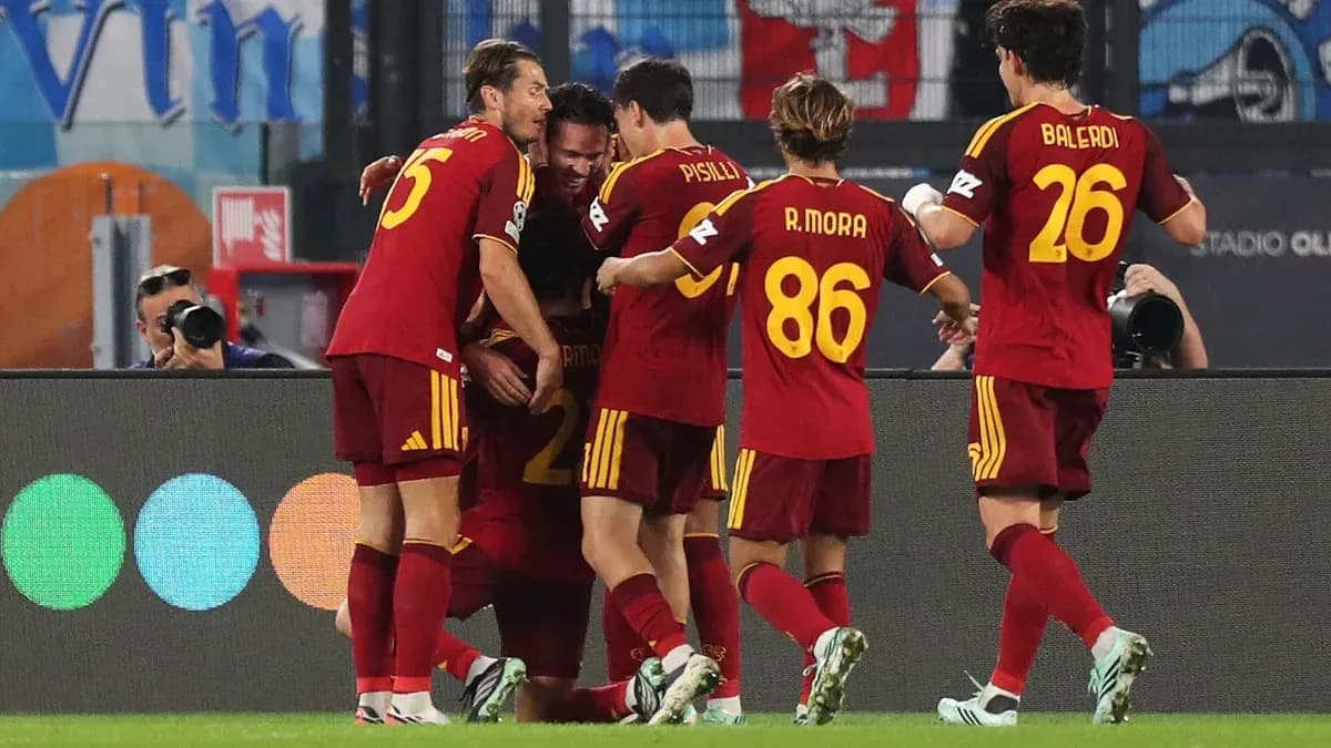 Players celebrating a goal during a match