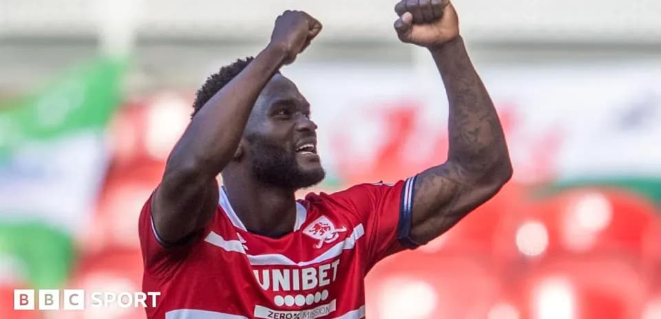 Player celebrating a goal with raised fists