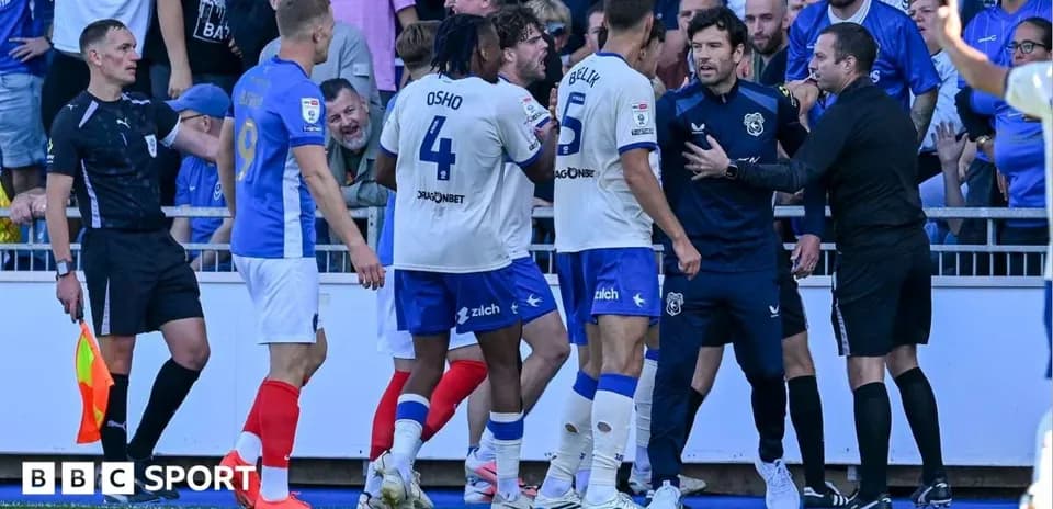 Players and officials arguing during match incident