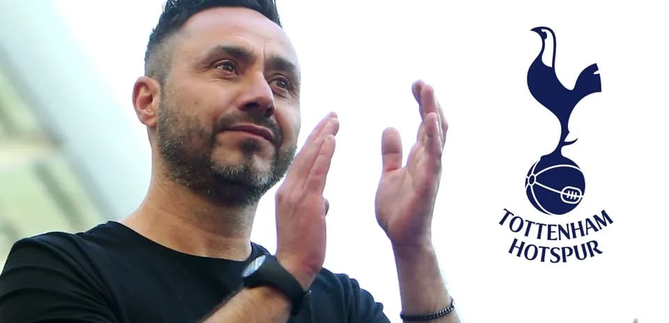 Coach applauding during Tottenham Hotspur event