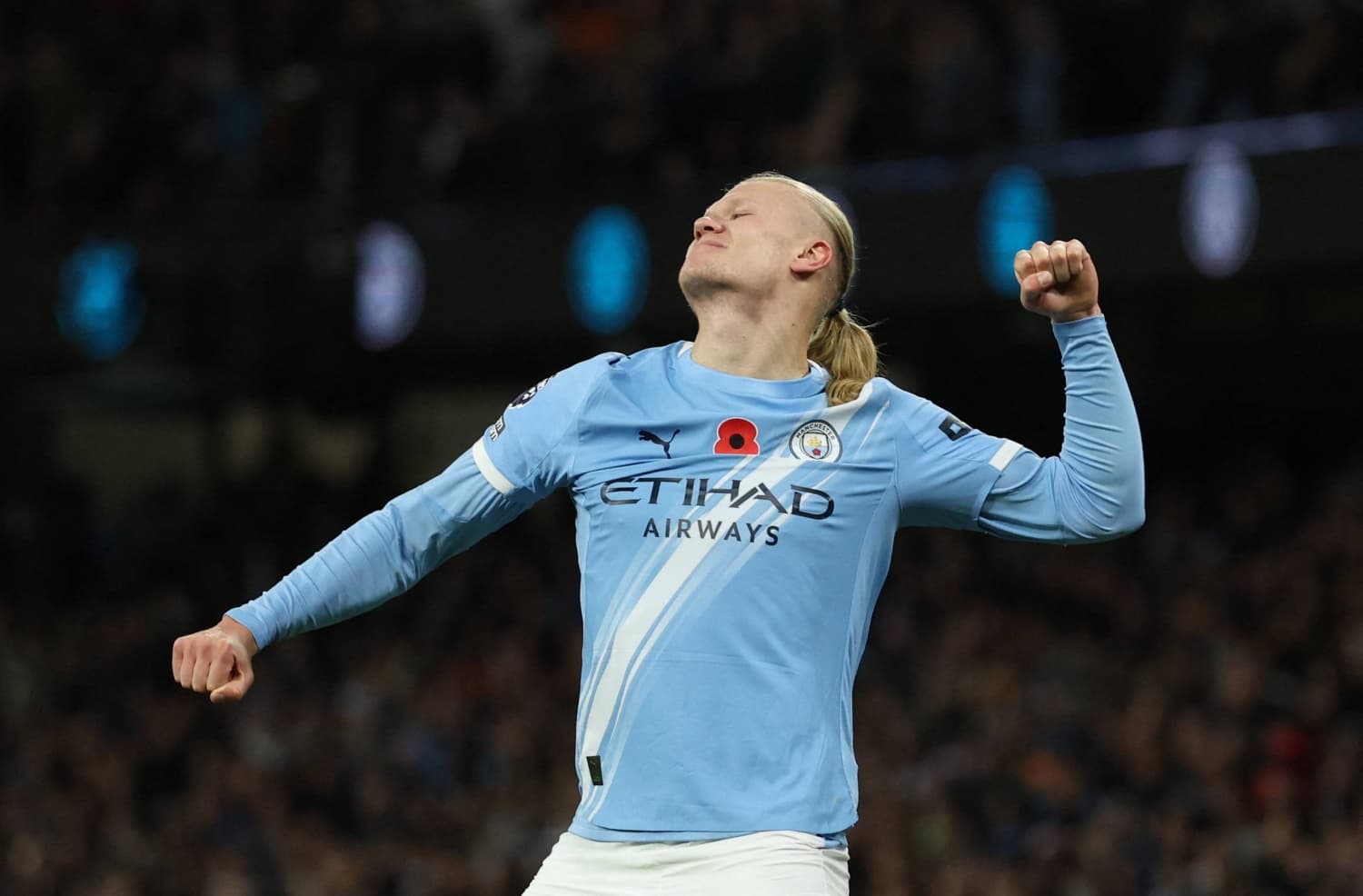 Erling Haaland celebrating after scoring a goal