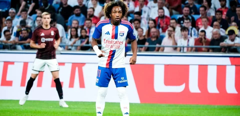 Lyon player positioned during a football match