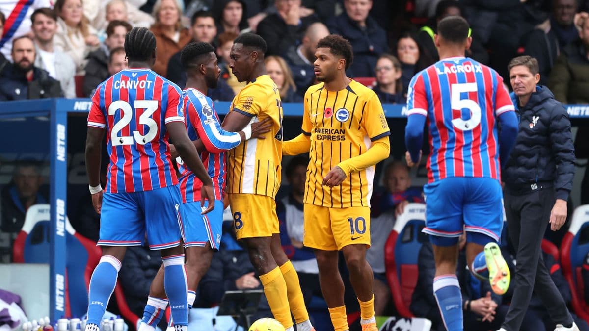Crystal Palace and Brighton players on field.