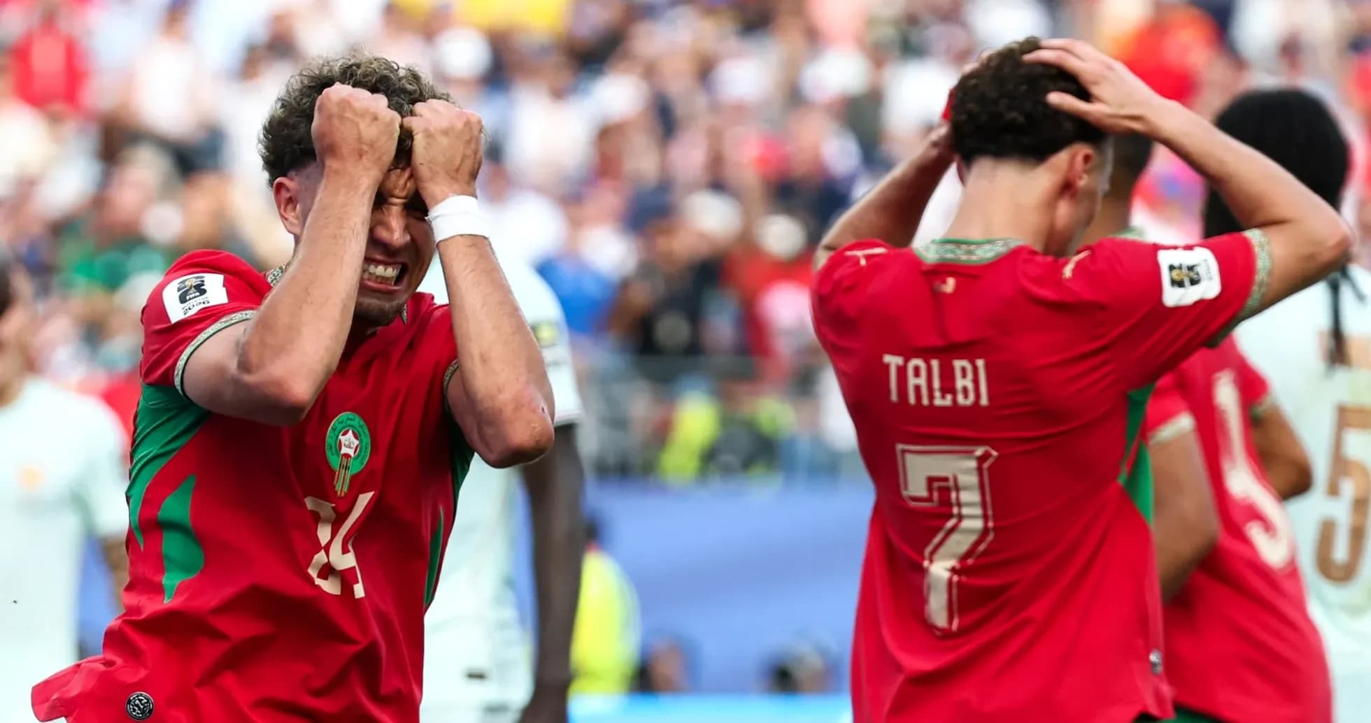 Moroccan players react after missed scoring opportunity