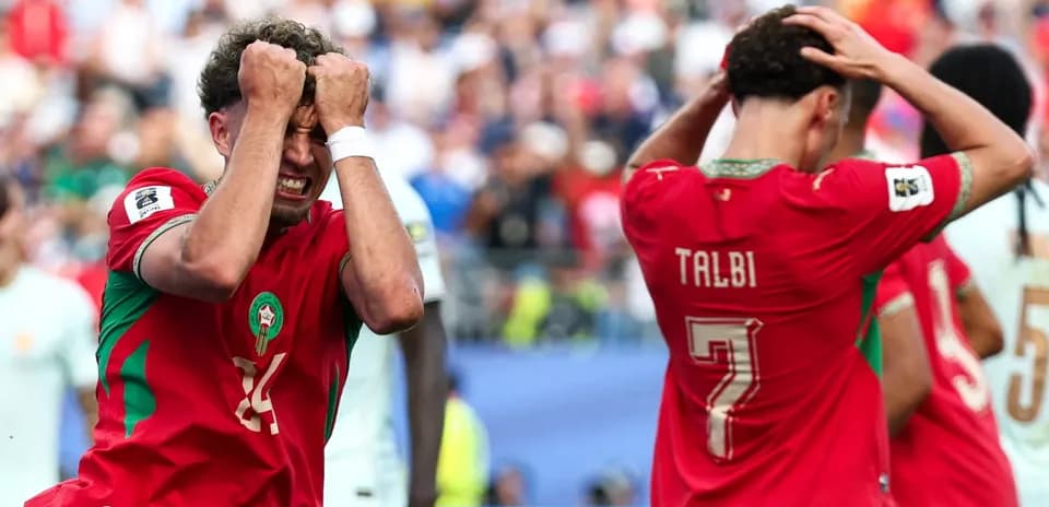 Moroccan players react after missed scoring opportunity