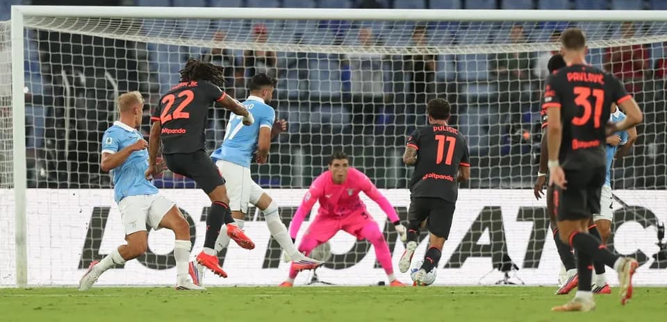 Lazio player attempting to score against AC Milan
