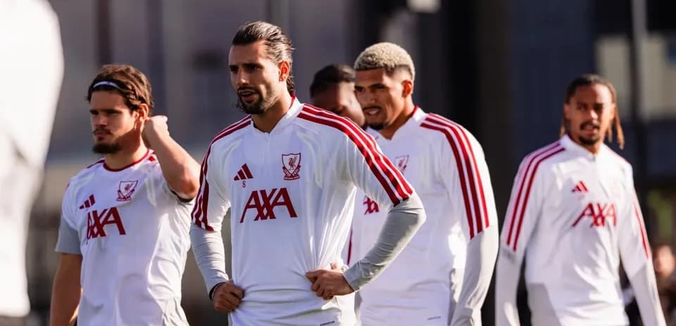 Liverpool players walking during training session