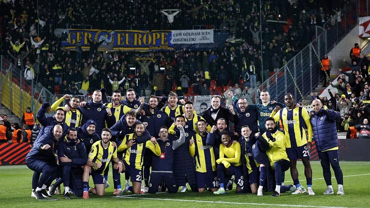 Fenerbahçe team celebrating with fans