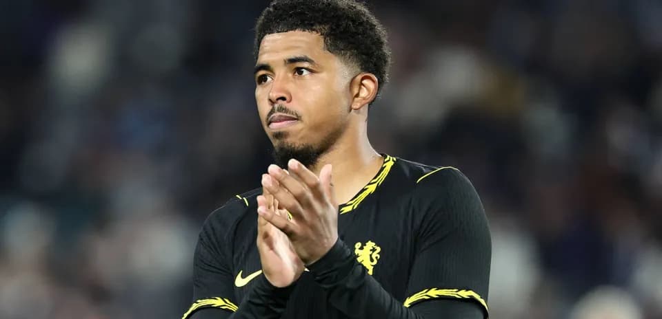 Player applauding fans after the match