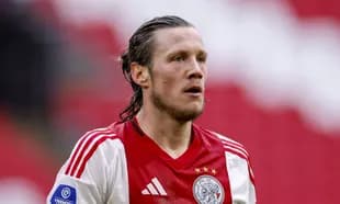 Player in Ajax jersey during match action