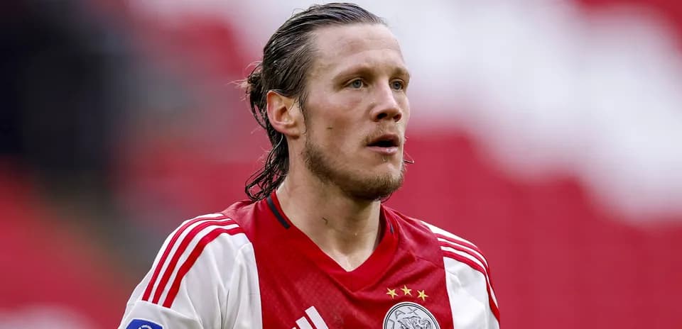 Player in Ajax jersey during match action