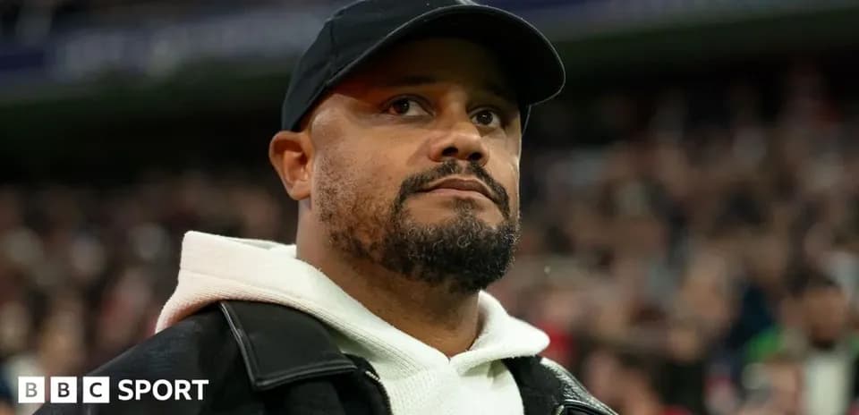 Person in a black cap at a sports event