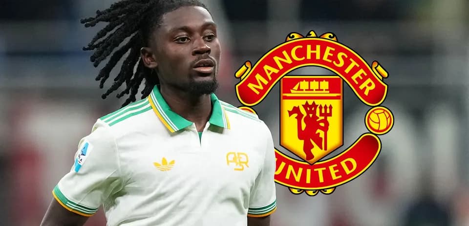 Player wearing white jersey with Manchester United logo