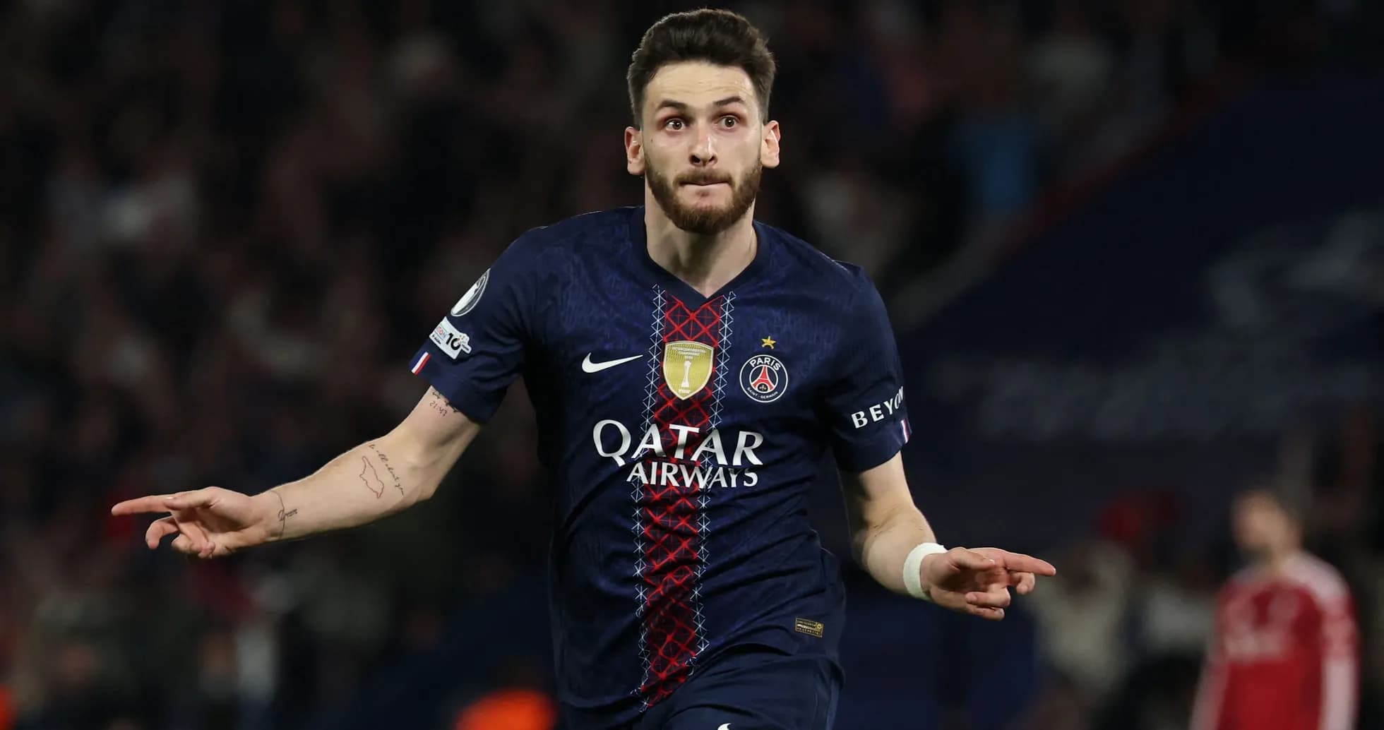 Player celebrating a goal for Paris Saint-Germain