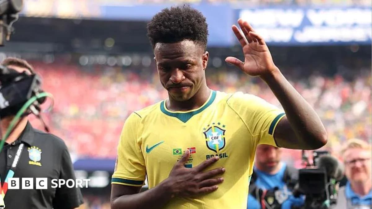 Player waving while leaving the field after match