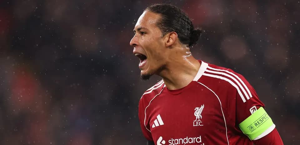 Player celebrating in Liverpool kit during match
