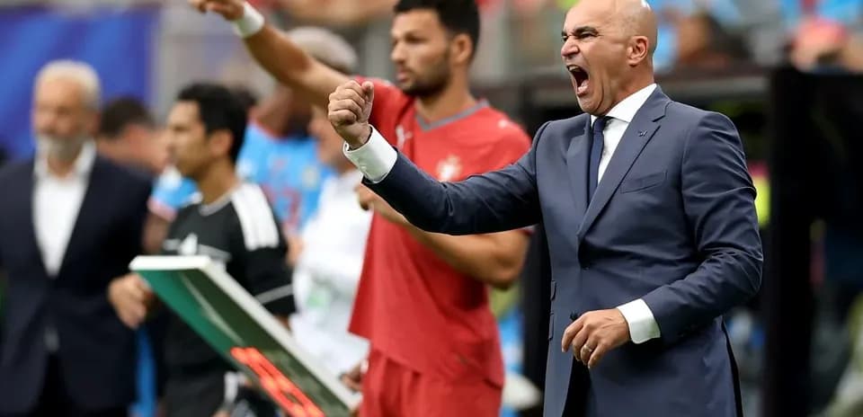 Coach passionately directing players from the sidelines