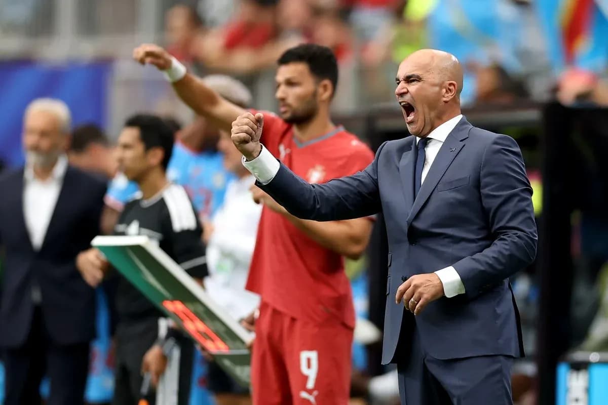 Coach passionately directing players from the sidelines
