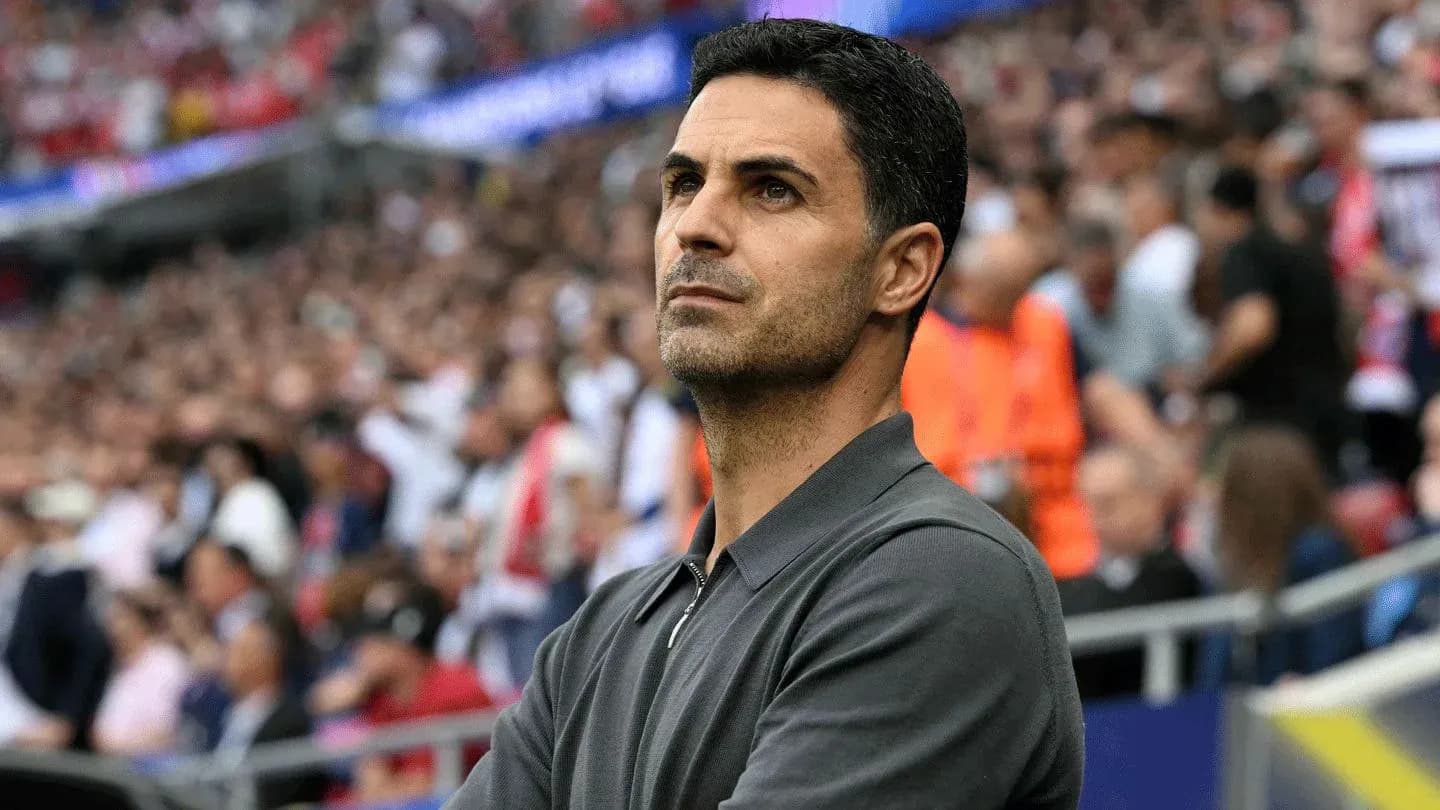 Coach observing the match from the sidelines