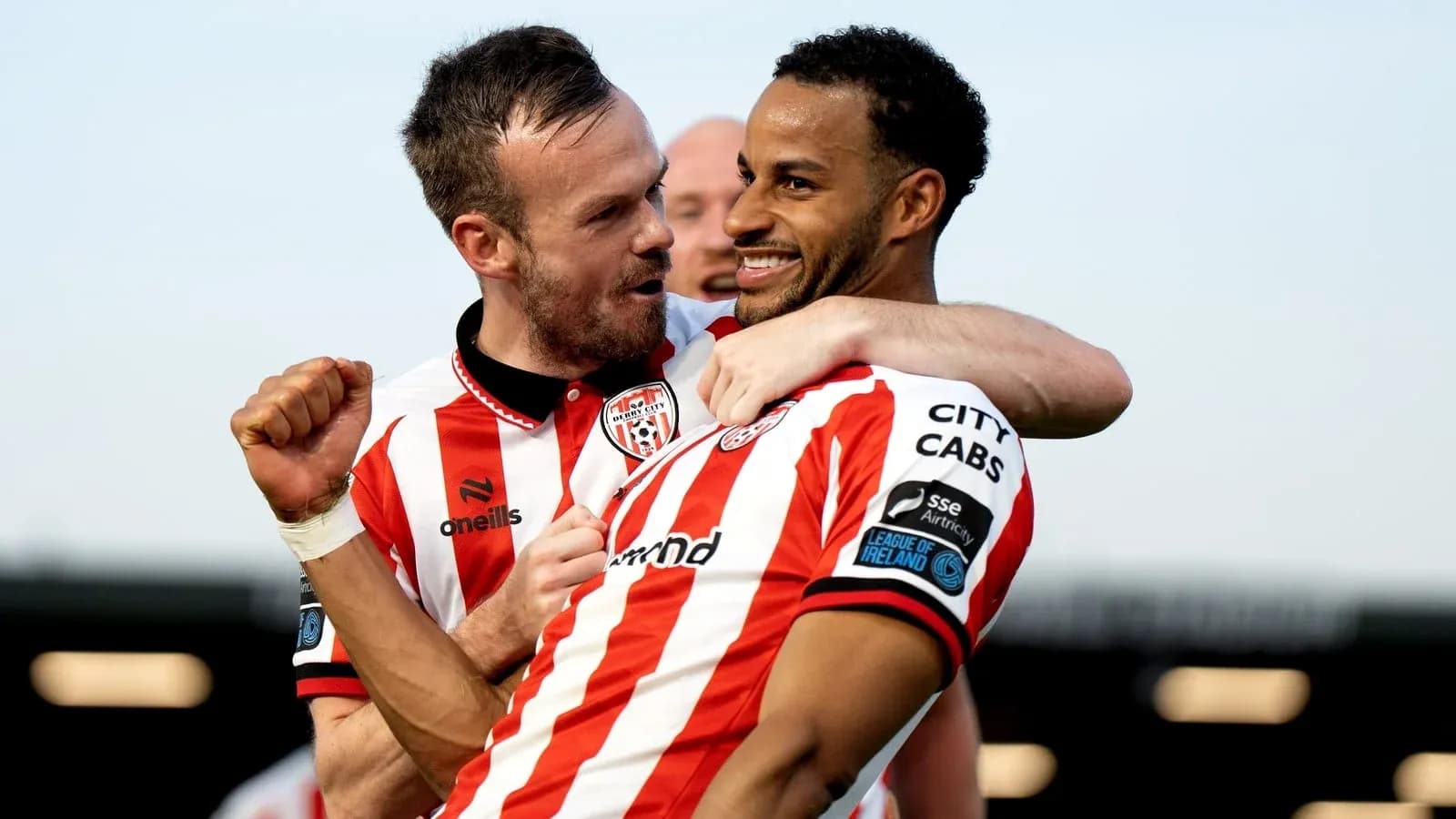 Two players celebrating after scoring a goal