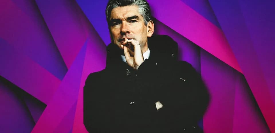 Man in a coat with a contemplative pose