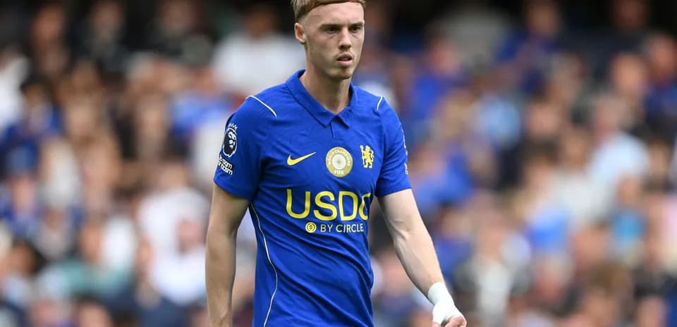 Player in blue Chelsea kit during match