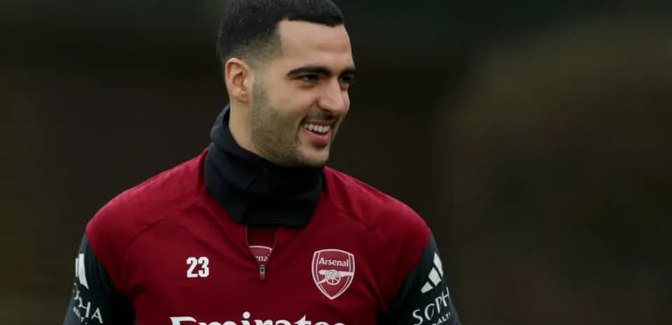 Arsenal player smiling during training session
