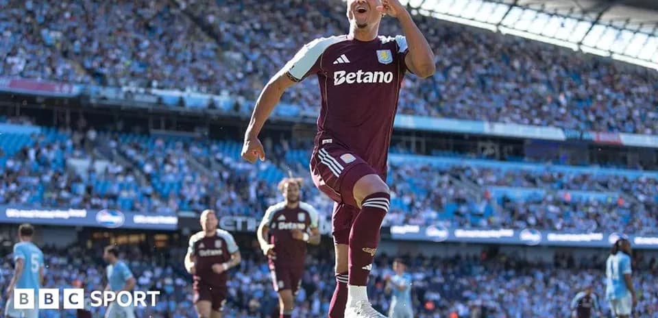 Aston Villa player celebrating a goal at stadium