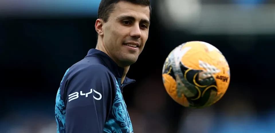 Player juggling a soccer ball during warm-up