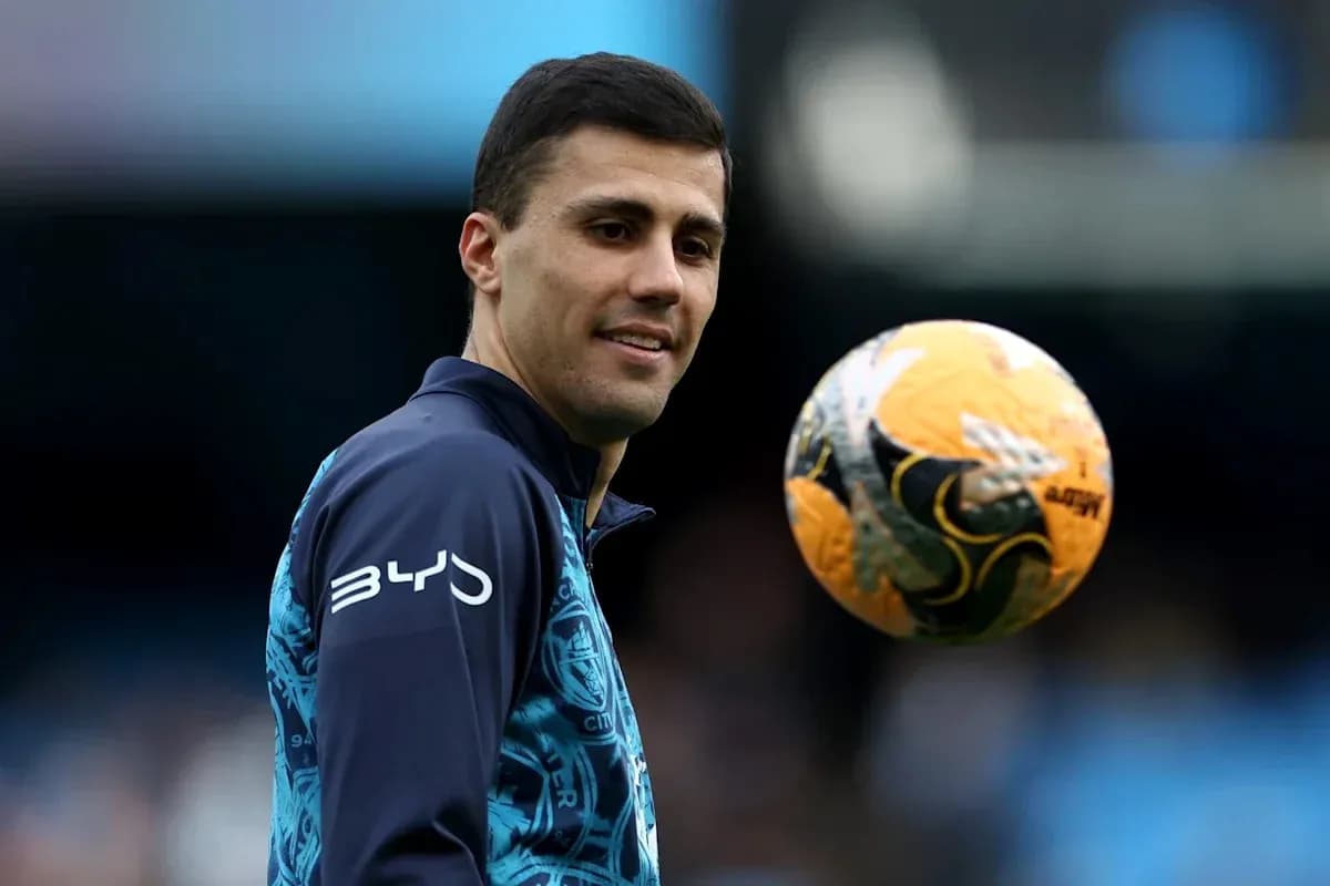 Player juggling a soccer ball during warm-up
