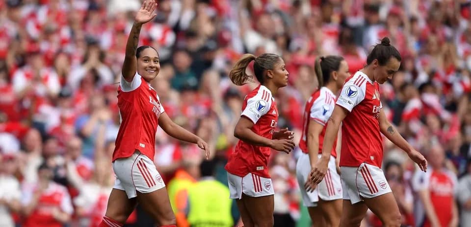 Arsenal players celebrating during a match