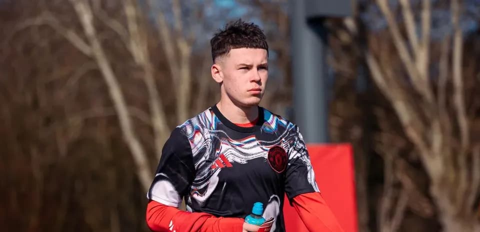 Player walking during training session with water bottle