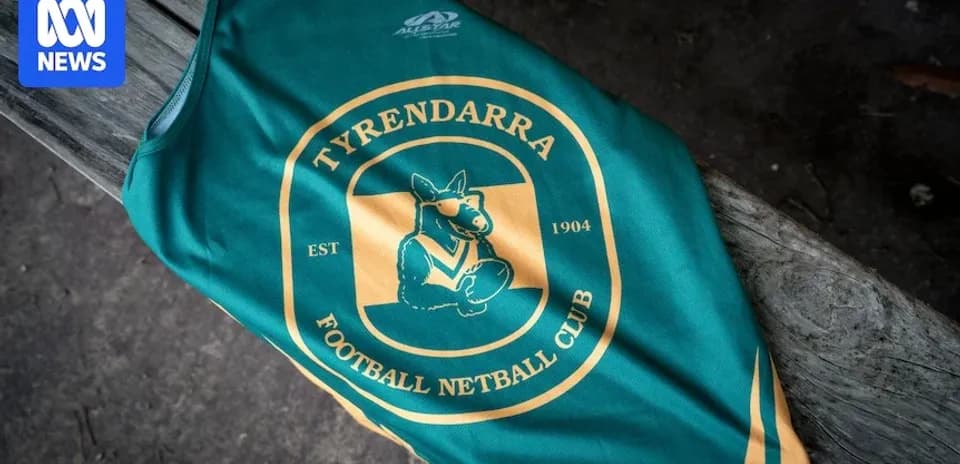 Tyrendarra Football Netball Club jersey on wooden surface