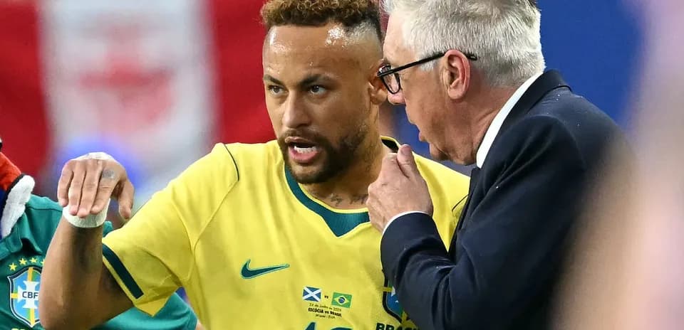 Neymar discussing tactics with coach during match