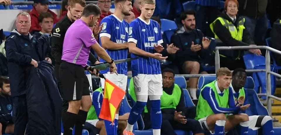 Substitute preparing to enter the match on sideline