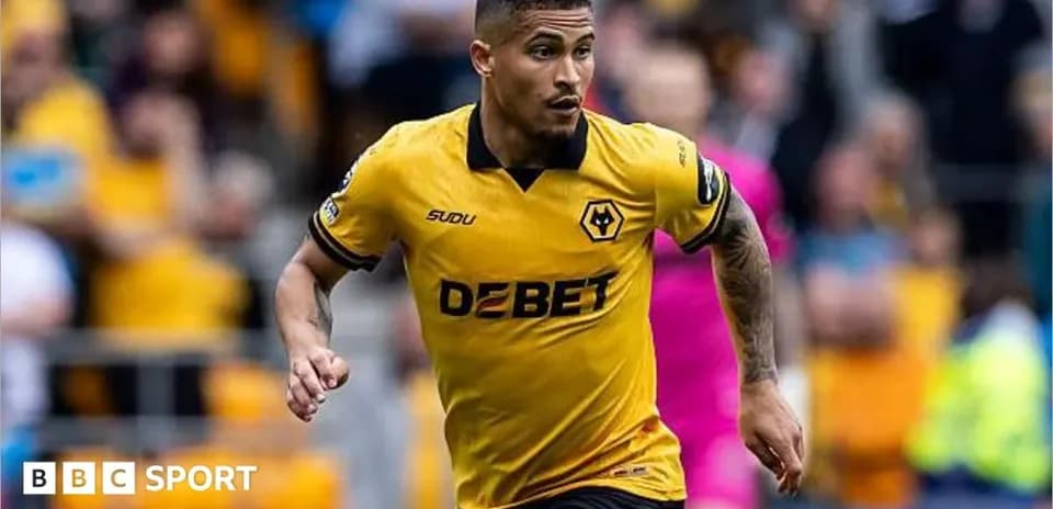 Player running during a match in yellow jersey