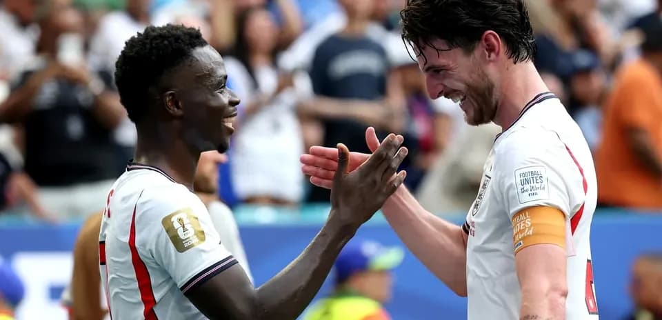 Two players celebrating together after a match