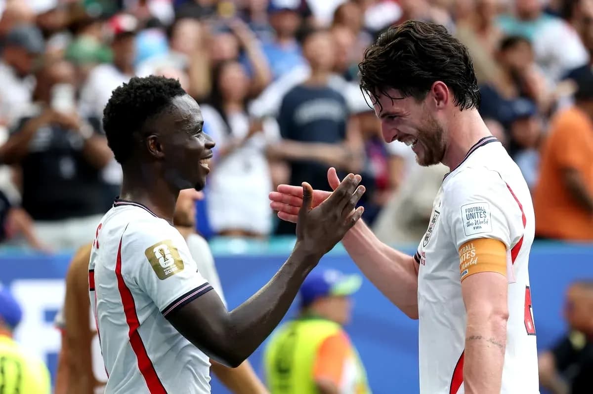 Two players celebrating together after a match
