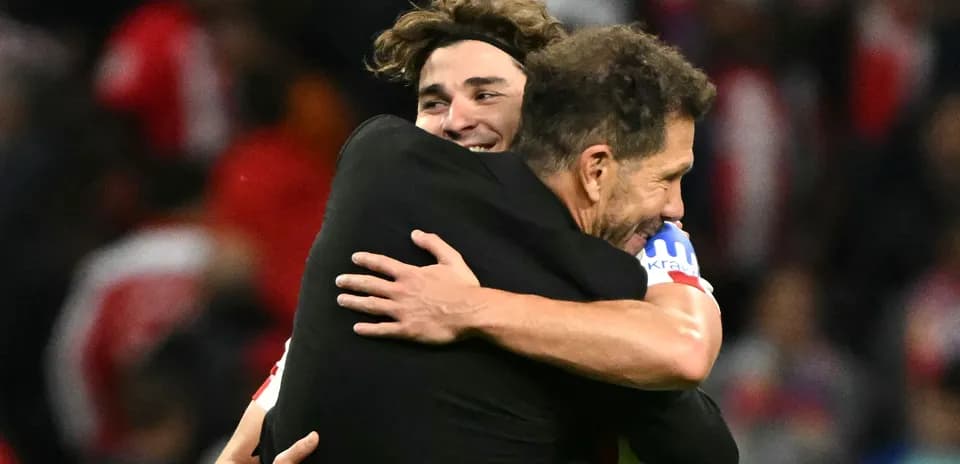 Players embracing after a successful match celebration