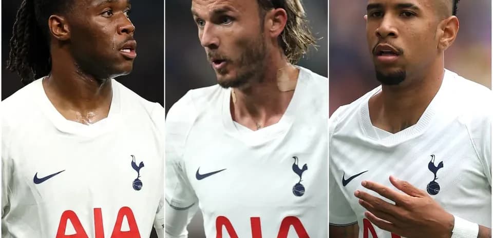 Three Tottenham players in white kits during match