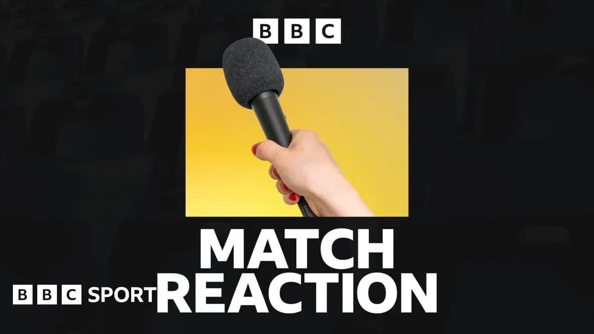 Hand holding microphone for match reaction segment