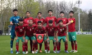Moroccan youth football team posing on the field